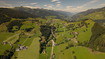View of the mountains in Austria. Sunset with colorful clouds. Snowy mountains in Austria.