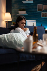 Disappointed, depressed, annoyed, unhappy woman reading eviction notice digital bank report using phone. Shocked, anxious female tenant by warning notification for unpaid bills