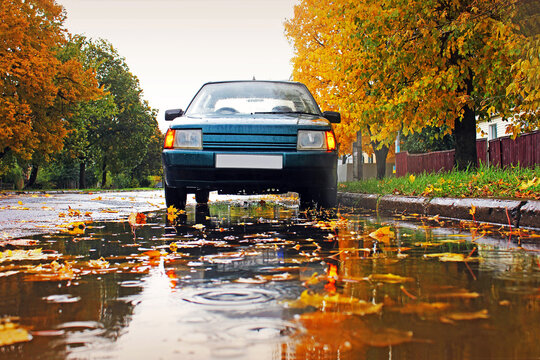 Chernigov, Ukraine - October, 2017; Zaz Slavuta. Beautiful autumn photo. Reflection of the car and autumn in the water