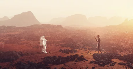 Foto op Canvas Astronaut ontmoet een buitenaards wezen op een planeet zoals Mars © Photocreo Bednarek