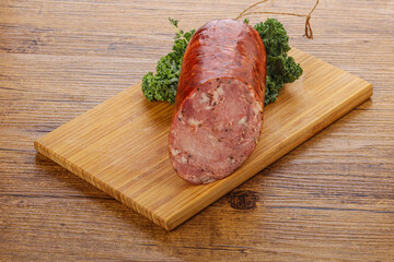 Pork ham sausage over board
