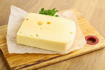 Maasdam cheese over the board