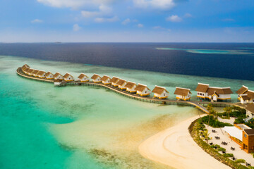 Amazing bird eyes view in Maldives island Eh'mafushi crossroads maldives at sunrise. Aerial drone shot. Saii lagoon and hard rock hotel. July 2021 © Сергій Вовк