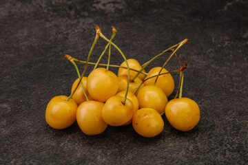 Sweet ripe yellow cherry heap