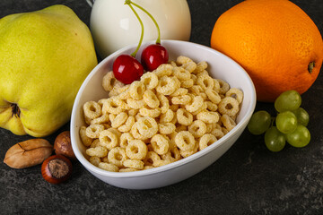 Breakfast with corn rings and milk
