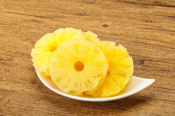 Sweet pineapple rings in the bowl