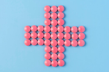 Pharmacy Cross Made of Red Pills Medicine Tablets