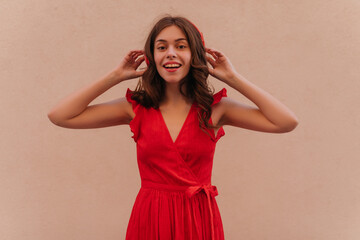 Hurray, the song of her favourite German artist started to play on the radio just yet. Young woman...