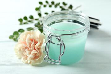 Natural spa cosmetics on white wooden table