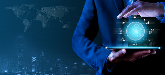 Businessman holding tablet showing virtual globe diagram. Social digital, Analysis strategy sale marketing and economic data online network connection. Business finance and digital technology concept.