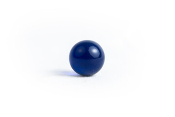blue glass marble, on white background