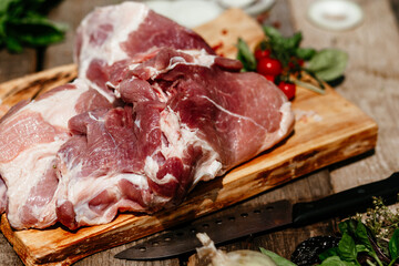 Pork pulp.raw piece of meat on a wooden board. 