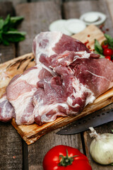 Pork pulp.raw piece of meat on a wooden board. 