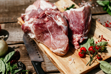 Pork pulp.raw piece of meat on a wooden board. 