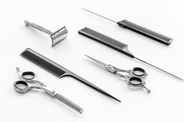 Barber tools with hairdressing scissors and combs