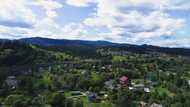 The viaduct in Vorokhta is a railway stone arch bridge across the Prut River aerial view