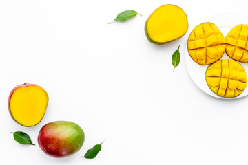 Mango slices and cubes in plate for fresh summer dinner