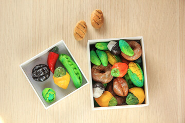 Salty dough vegetables and bread. Painted handmade figures