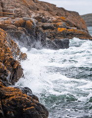 waves crashing on rocks