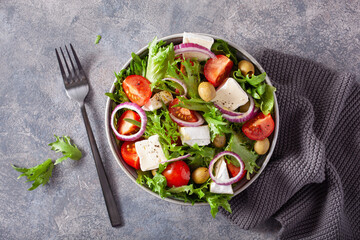 tomato salad with brie cheese olives onion lettuce