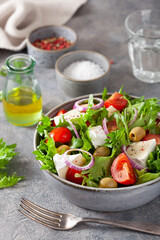tomato salad with brie cheese olives onion lettuce