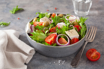 tomato salad with brie cheese olives onion lettuce
