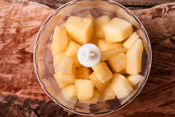 Melon. Sliced melon for making fruit dessert in blender for proper nutrition on an old wooden background. Mock up. Top view.