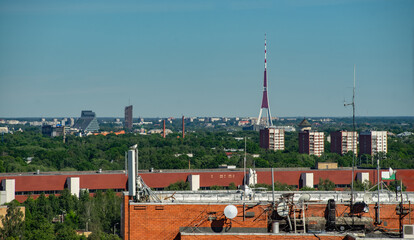 Summer cityscape of Riga. Top view. Urban architecture. TV tower.