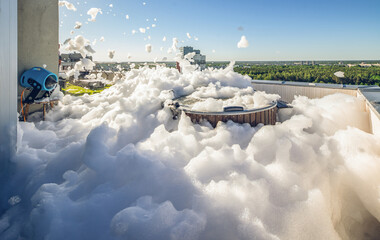 Foam party on the outdoor terrace of modern luxury apartments.