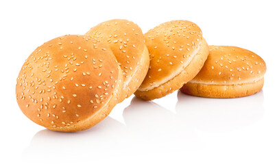 Four hamburger buns with sesame isolated on white background