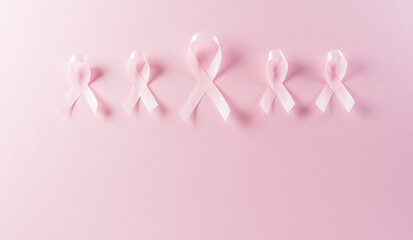 Pink ribbons on pastel background, Symbol of women's breast cancer awareness, Health care and medical concept.