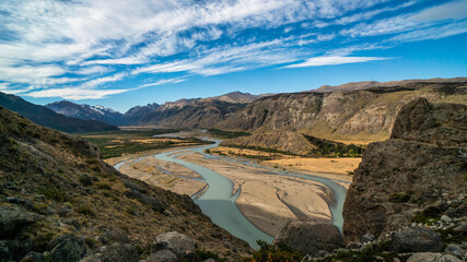 the turns river with a spectacular view of the valley landscape with the glacial river as a highlight. El Chalten, Santa Cruz, Argentina.