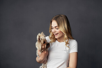 beautiful woman a small dog fun Studio isolated background