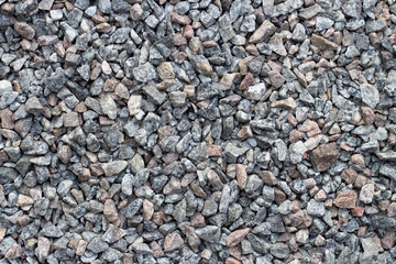 Decorative gray and white pebble stones as background. High quality photo