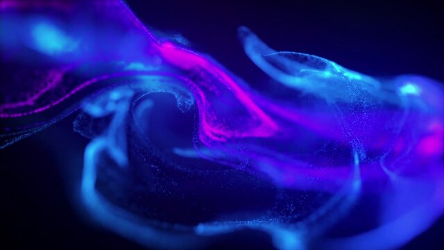 Abstract color particles moving in slow motion on black background 4k footage