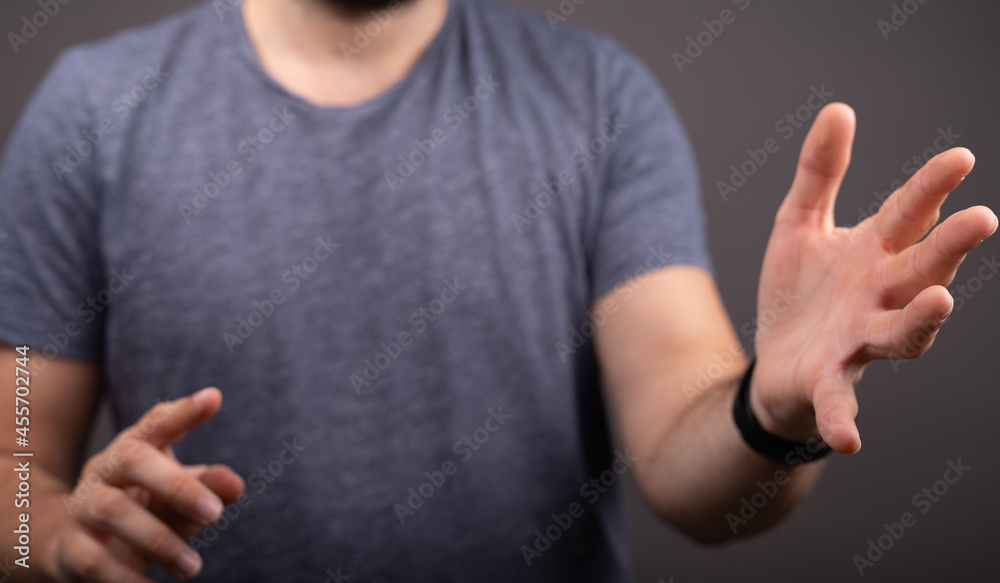 Poster man showing his empty hand.