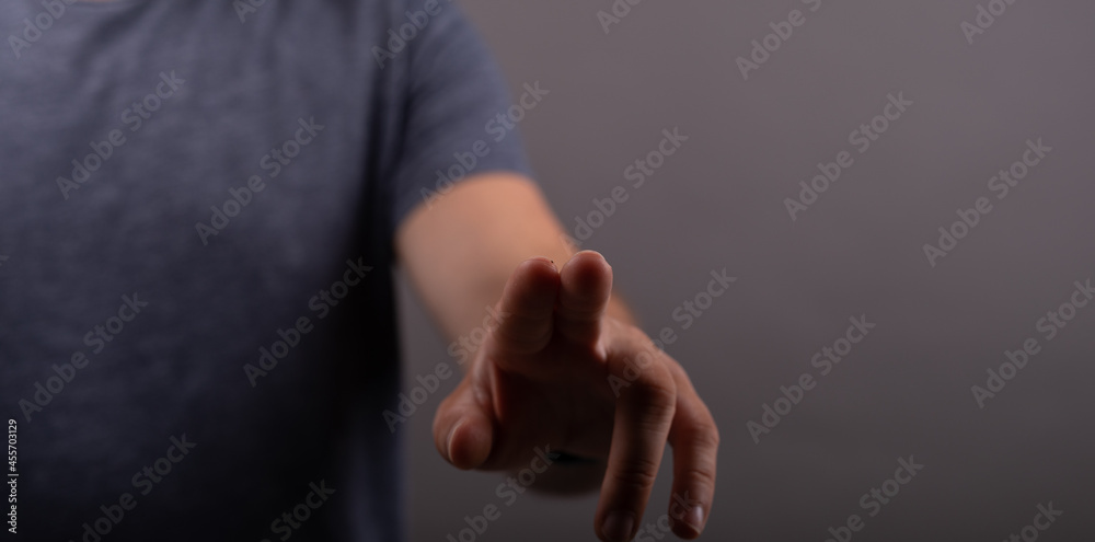 Poster Hand pushing on a touch screen..