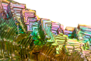 Obraz premium Macro of the mineral bismuth stone on a white background