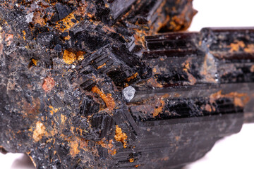 macro mineral stone sherle, schorl, black tourmaline on white background