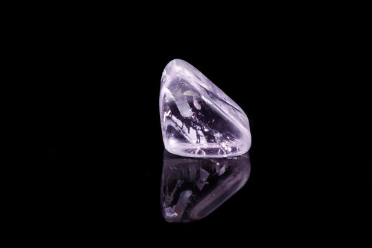 Macro mineral stone spodumene kunzite black background