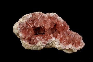 Macro mineral stone Pink Amethyst on a black background