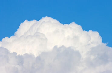 blue sky with fluffy white clouds