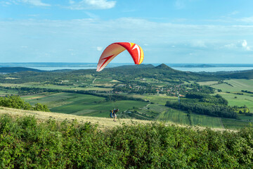 Paraglider over the mountains of lake Balaton in Hungary