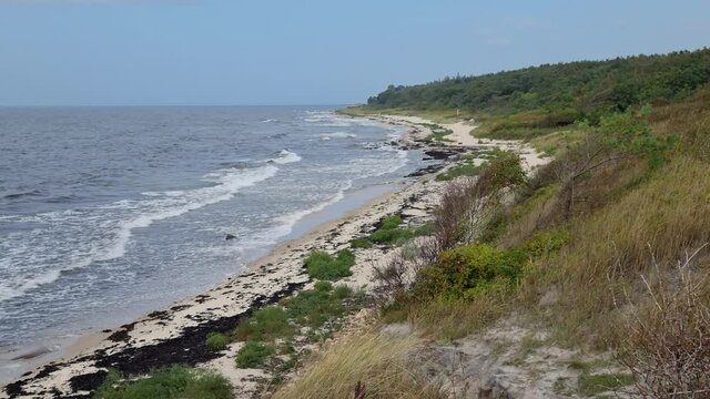 Windy day in Denmark island Bornholm beach.
2021 summer season