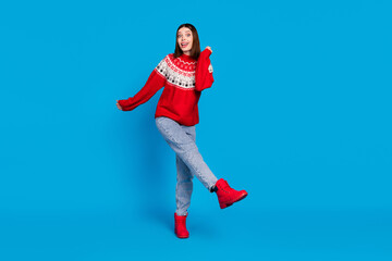 Fototapeta na wymiar Full length body size photo woman in red sweater dancing at party isolated vivid blue color background