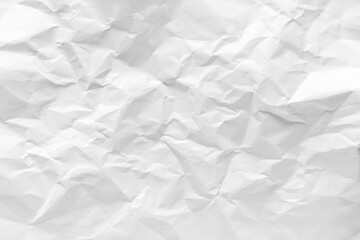 White crumpled paper texture background.