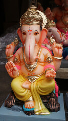 Hindu God Ganesha. Ganesha Idol on plain background.