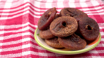 Fresh Figs or Anjeer fruit healthy vegan food concept organic dry fruits on wooden background.