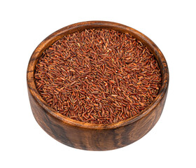 Red rice in wooden bowl isolated on white background