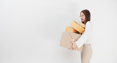 Happy Asian youngwoman holding package parcel box at home, Delivery courier and shipment service concept